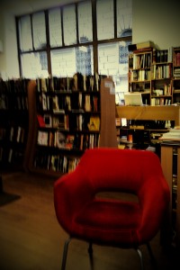 A red chair in a bookstore